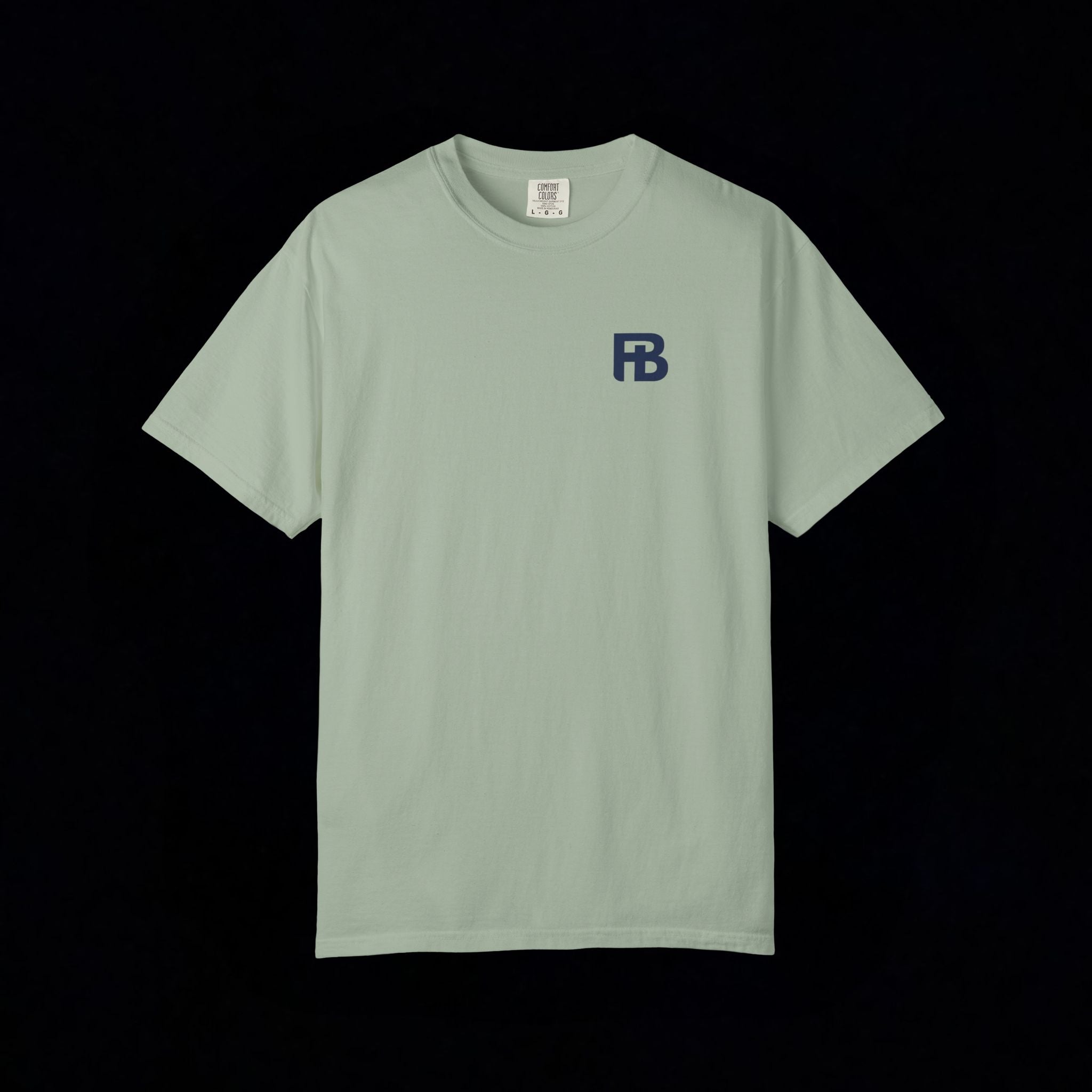 Light green t-shirt with a small logo on a black background